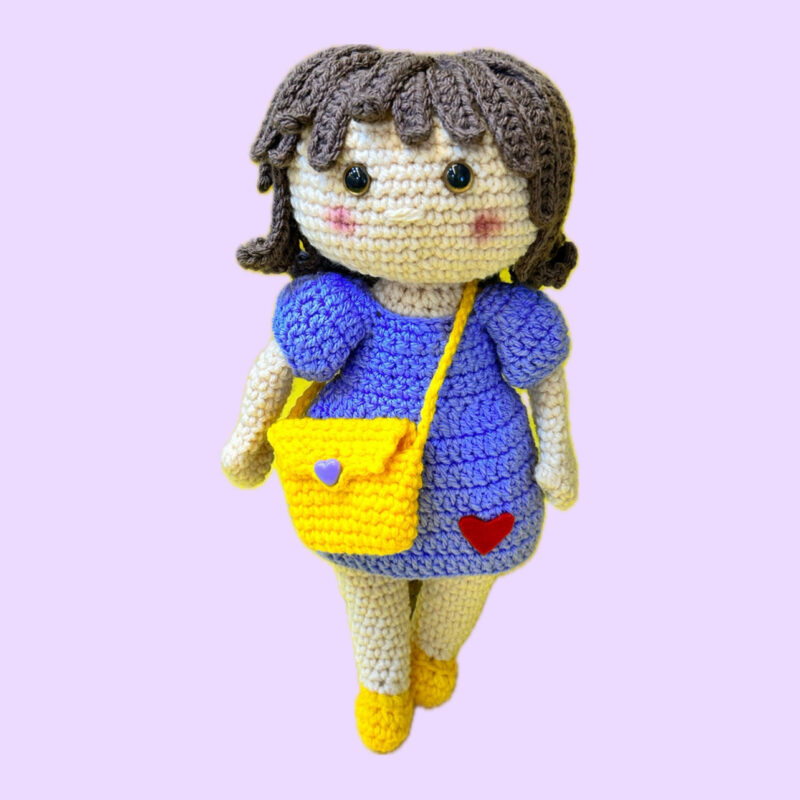 Handmade Crochet Doll with Yellow Bag – A Bundle of Love & Cheer